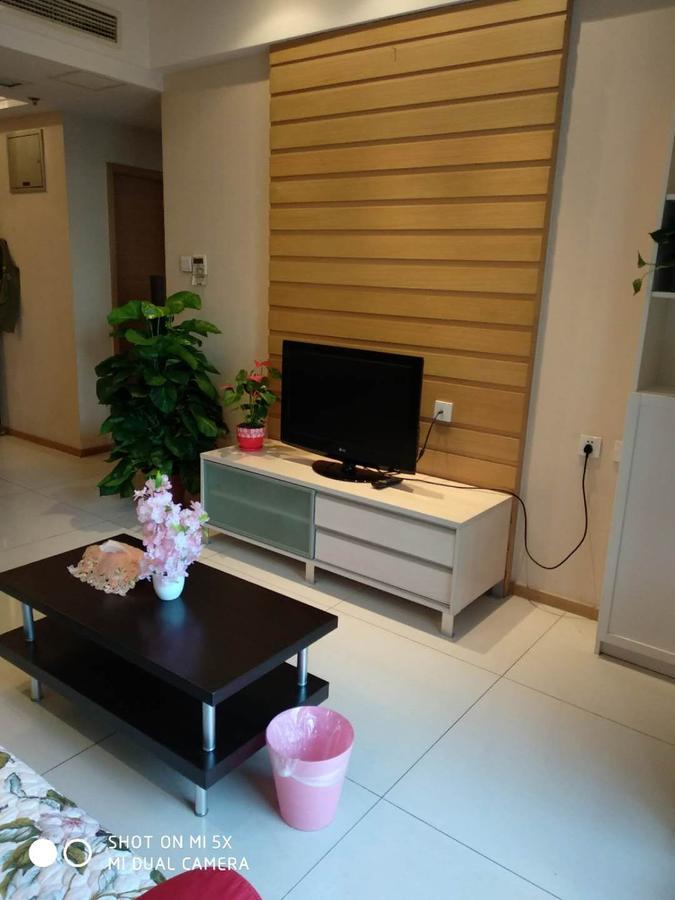 Tiandi Huadian Apartment *