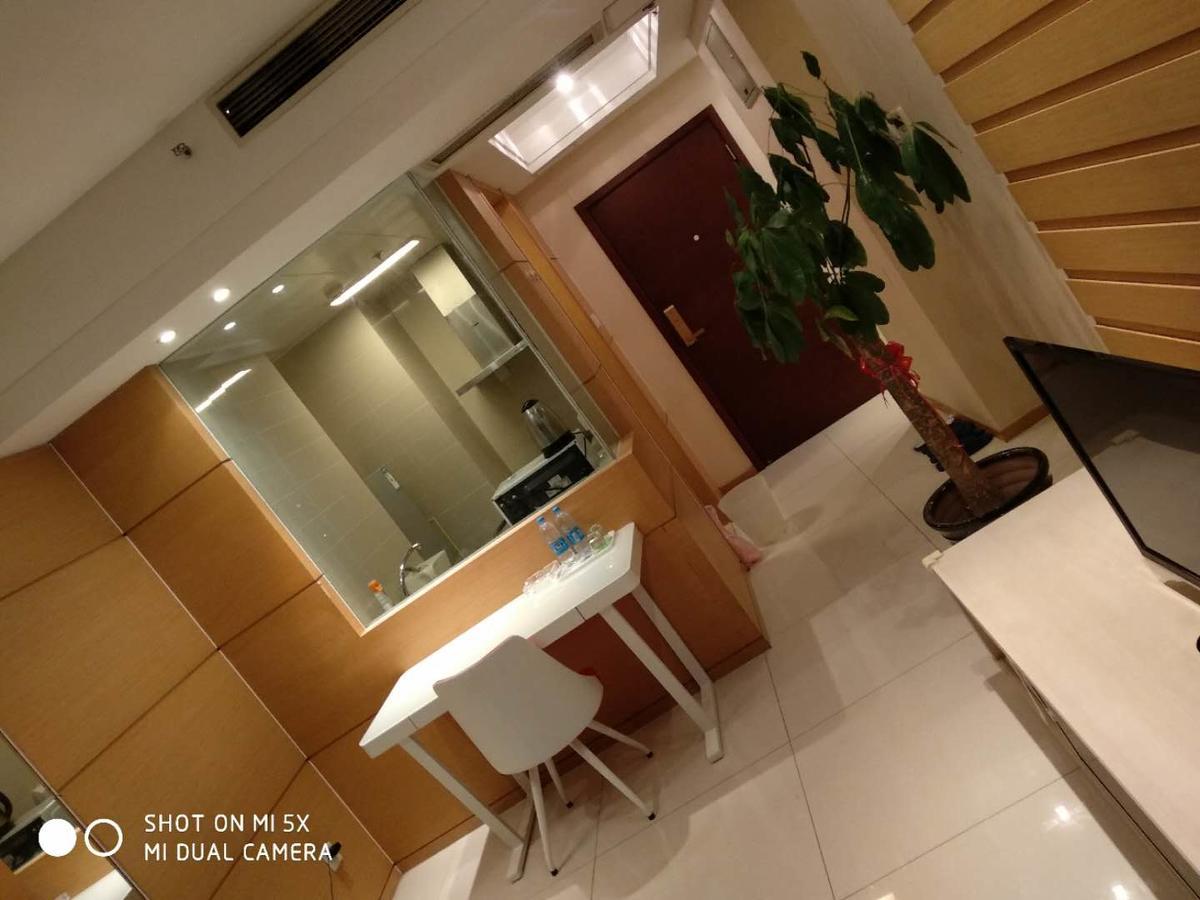 Tiandi Huadian Apartment *